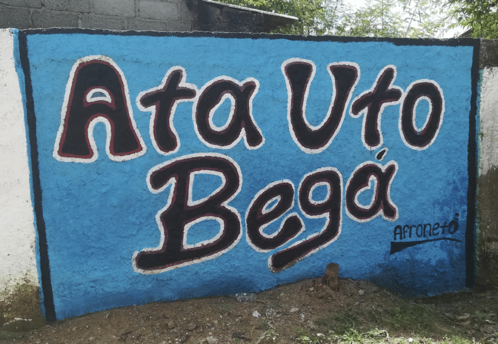 Traveller taking a photo in San Basilio de Palenque